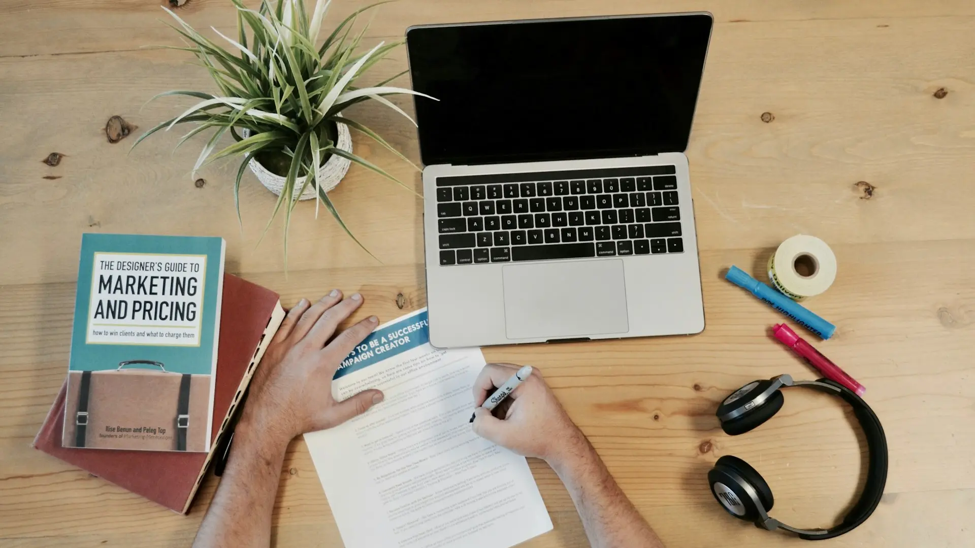 MacBook Pro near headphones